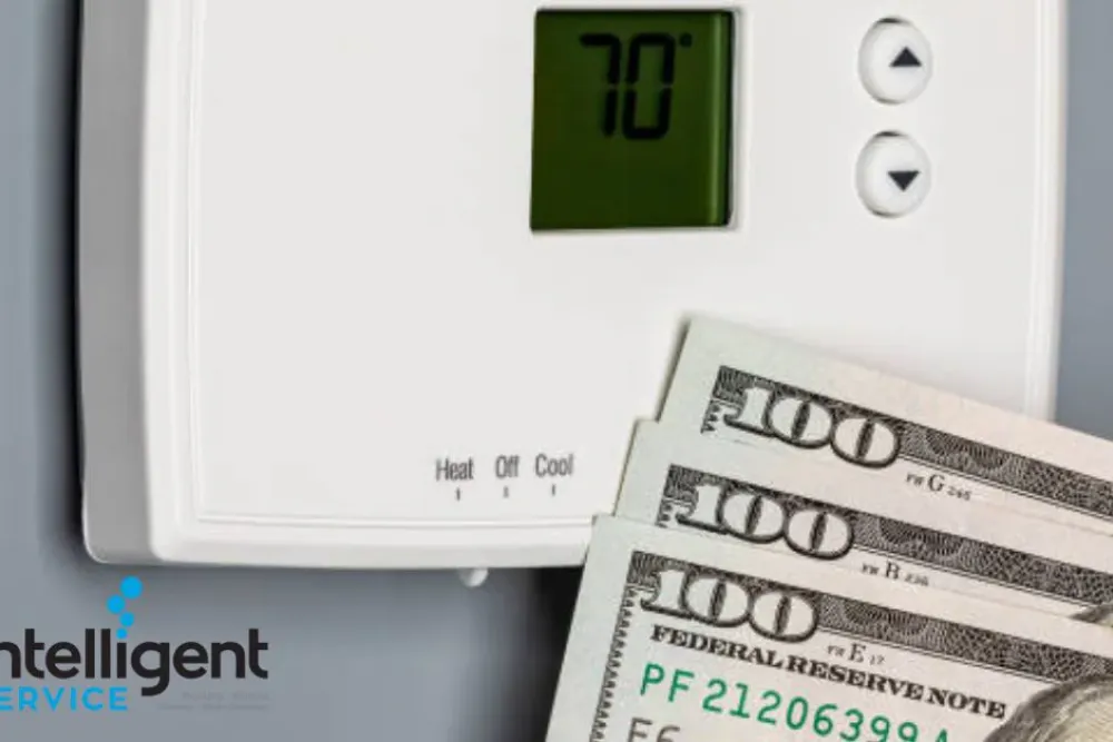 Thermostat set at 70 degrees with hundred-dollar bills, Intelligent Service logo visible.