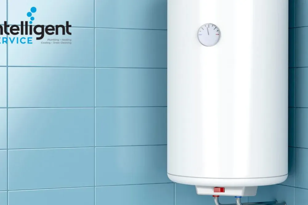 White water heater on blue tiled wall with Intelligent Service logo, offering plumbing and HVAC solutions.